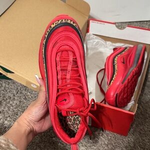 Nike Vibrant Red Sneakers with Leopard Detail